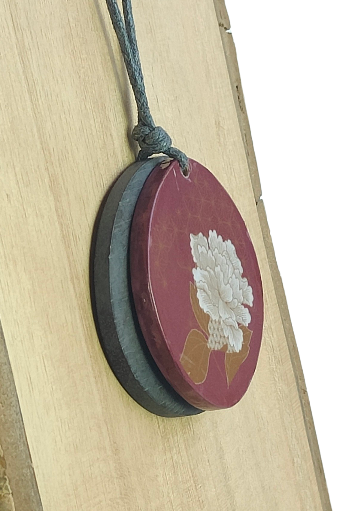 Colgante circular con hojas