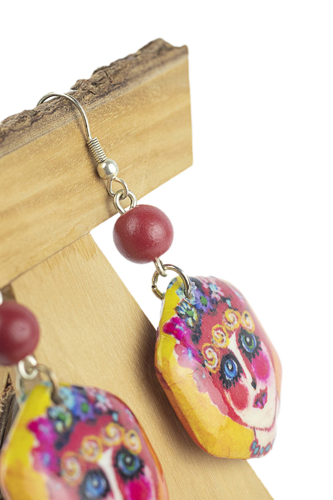 Earring with hexagonal piece