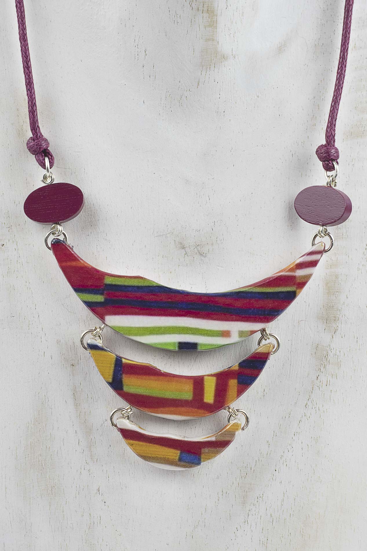 Colgante de tres piezas con print geometrico multicolor