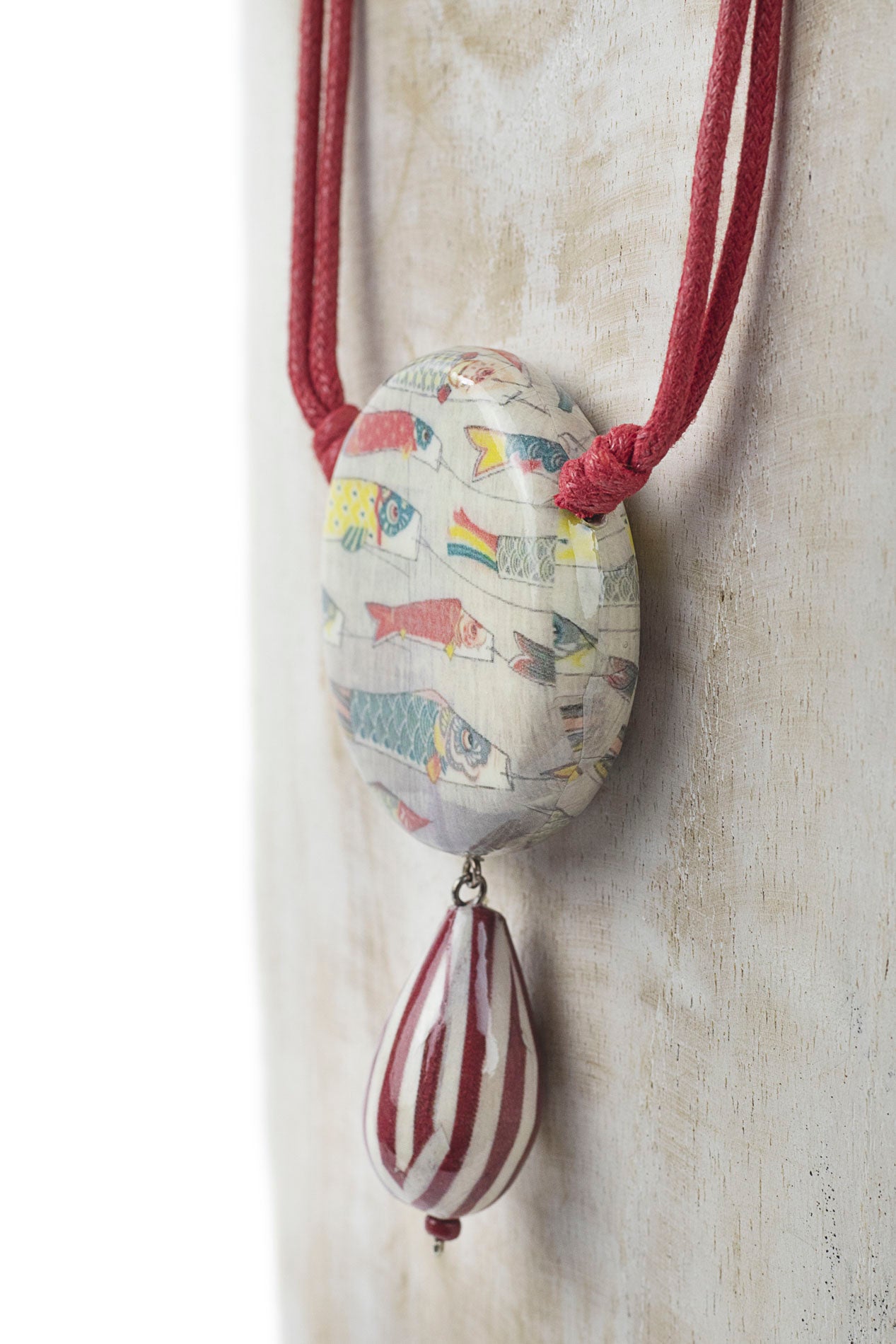Colgante de tres piezas con print de peces