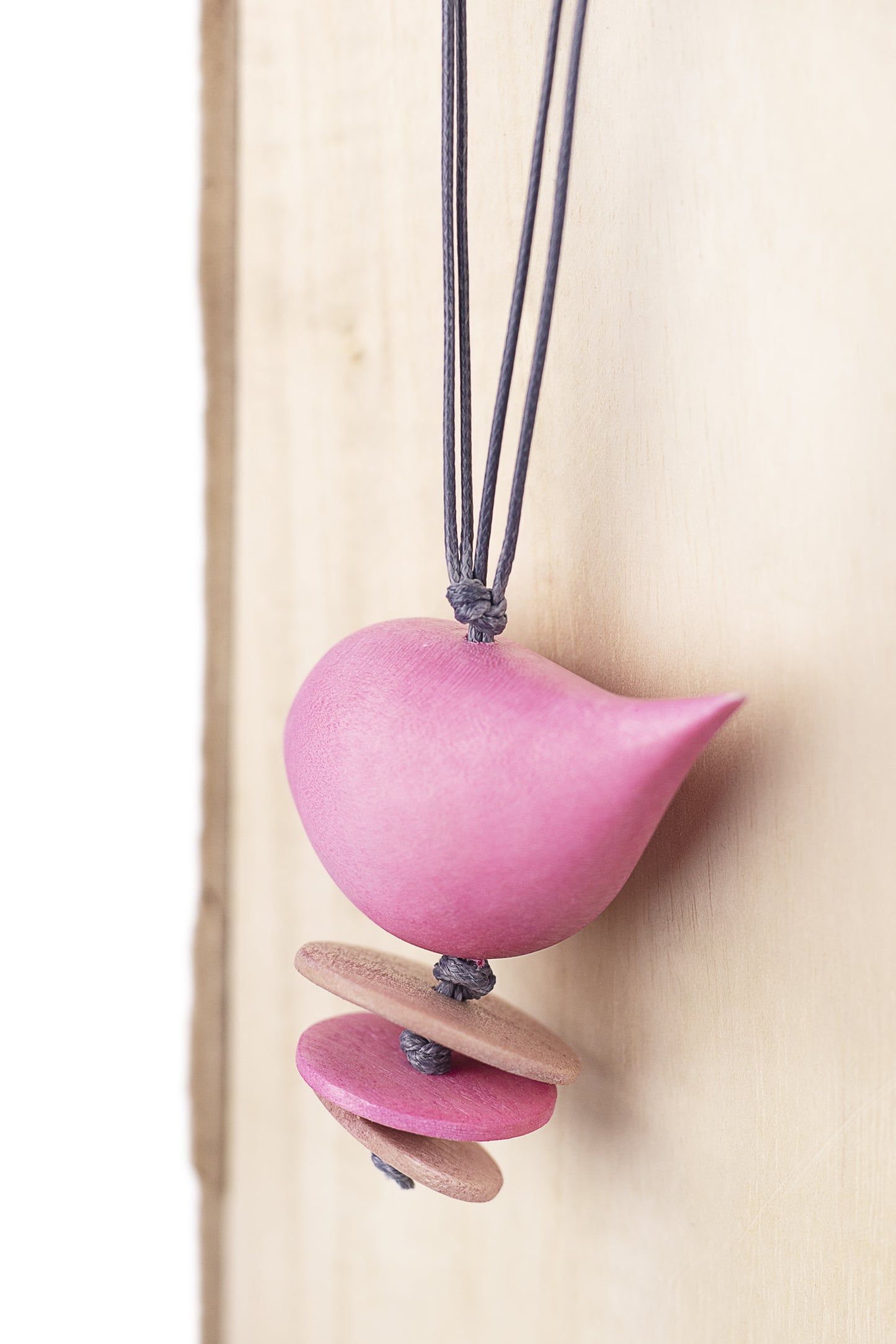 Wooden pendant with bird