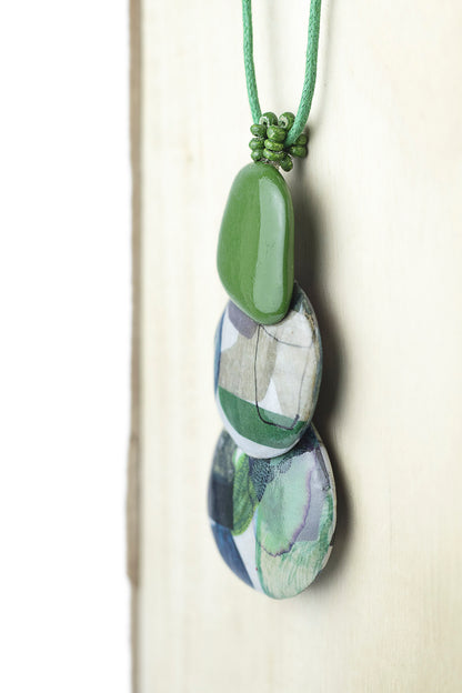 Pendant with three organically shaped pieces