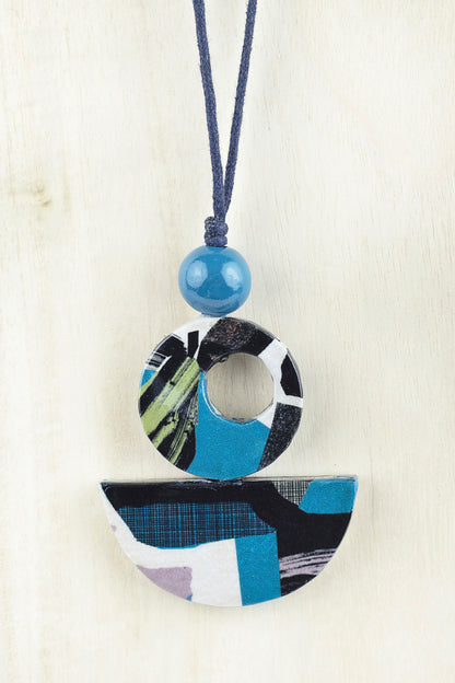 Pendant with semi-circular pieces