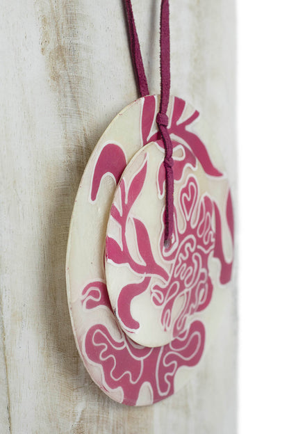Colgante doble disco en fucsia